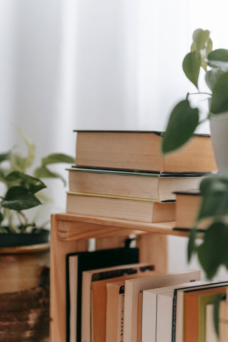 selective focus photo of stack of books